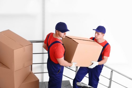 Moving van and boxes ready for a house relocation service