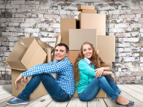 Careful wrapping of fragile household items during a Clapton packing service