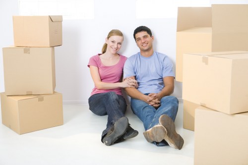 Local removals van handling furniture and boxes in Clapton