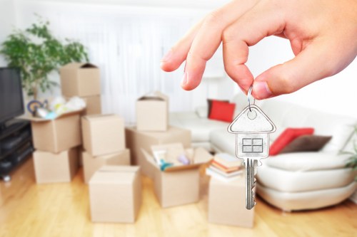 Packed boxes and furniture ready for a local home move in Clapton