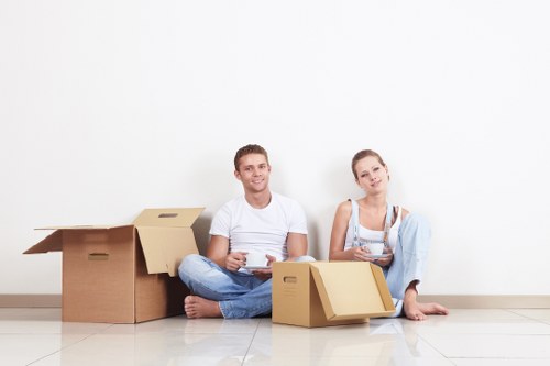 Clapton movers loading boxes and furniture into a moving van