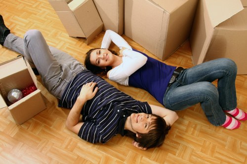 Organised unpacking of boxes in a Clapton home after moving day