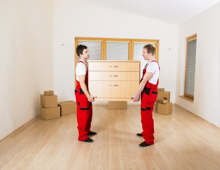Professional man with a van handling a local move in Clapton
